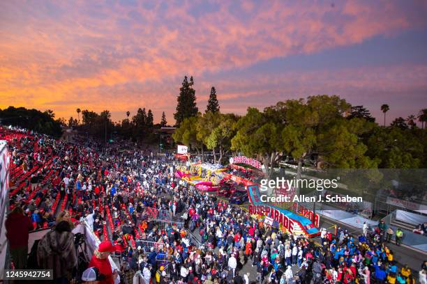 Pasadena, CA Parade-goers get a pre-dawn view of The 2023 Tournament of Roses Parade before it makes its way down Orange Grove Blvd., turning onto...