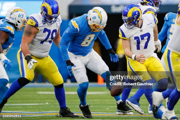 Inglewood, CA, Sunday, January 1, 2022 - Los Angeles Chargers linebacker Kyle Van Noy forces Los Angeles Rams quarterback Baker Mayfield to fumble...