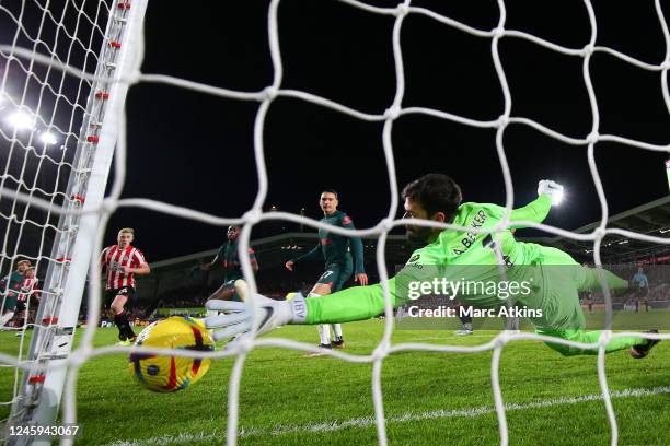 Ibrahima Konate of Liverpool scores an own goal during the Premier League match between Brentford FC and Liverpool FC at Brentford Community Stadium...