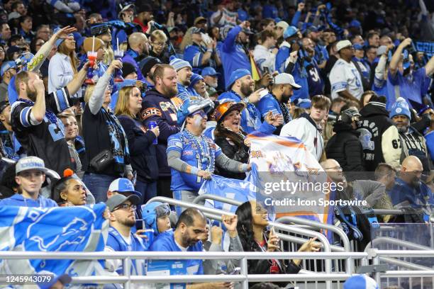 Detroit fans cheer during the fourth quarter of an NFL football game between the Chicago Bears and the Detroit Lions on January 1, 2023 at Ford Field...