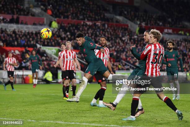 Alex Oxlade-Chamberlain of Liverpool scores their 1st goal during the Premier League match between Brentford FC and Liverpool FC at Brentford...