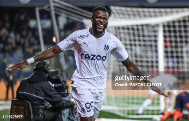 Marseille's Congolese defender Chancel Mbemba celebrates after scoring his team's second goal during the French L1 football match between Montpellier...