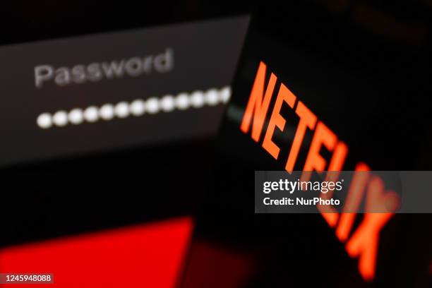 Netflix sign in page displayed on a laptop sscreen and Netflix logo displayed on a phone screen are seen in this illustration photo taken in Krakow,...