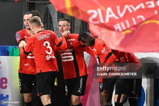 Rennes French midfielder Benjamin Bourigeaud celebrates after scoring a goal during the French L1 football match between Stade Rennais FC and OGC...