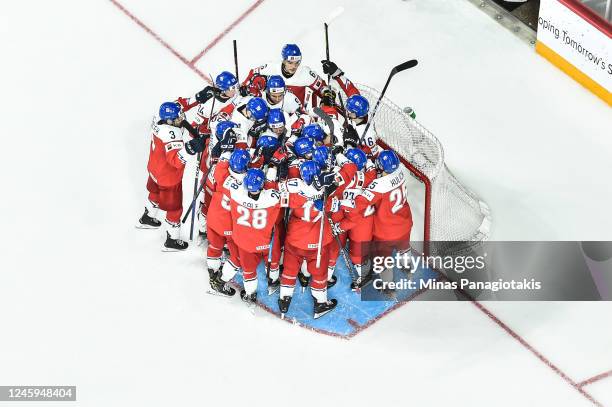 Team Czech Republic celebrates their victory against Team Switzerland in the quarterfinals of the 2023 IIHF World Junior Championship at Scotiabank...