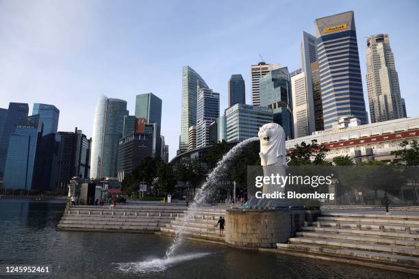 The Merlion statue and buildings in Singapore, on Tuesday, Jan. 3, 2023. Singapore's recovery held up in 2022, with a relatively strong year-end...