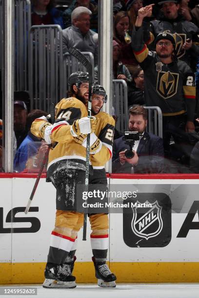 Nicolas Hague and Michael Amadio of the Vegas Golden Knights celebrate a goal against the Colorado Avalanche at Ball Arena on January 2, 2023 in...