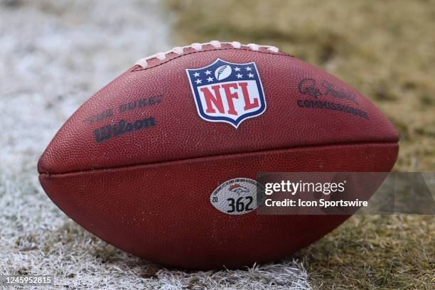 View of the NFL logo on a football before an AFC West game between the Denver Broncos and Kansas City Chiefs on January 1, 2023 at GEHA Field...