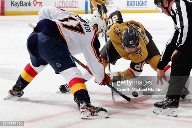 Compher of the Colorado Avalanche faces off against Chandler Stephenson of the Vegas Golden Knights at Ball Arena on January 2, 2023 in Denver,...