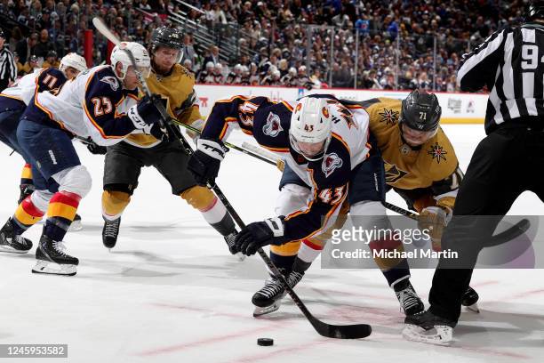 Darren Helm of the Colorado Avalanche skates against William Karlsson of the Vegas Golden Knights at Ball Arena on January 2, 2023 in Denver,...