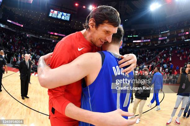 Boban Marjanovic of the Houston Rockets hugs Luka Doncic of the Dallas Mavericks after the game on January 2, 2023 at the Toyota Center in Houston,...