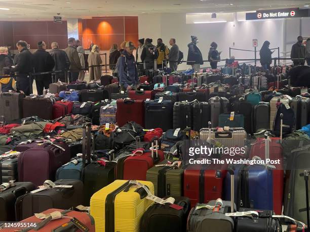 In addition to flight delays,cancellations, and reportedly a ticket system crash, hundreds of passengers wait in line to handle their baggage claim...