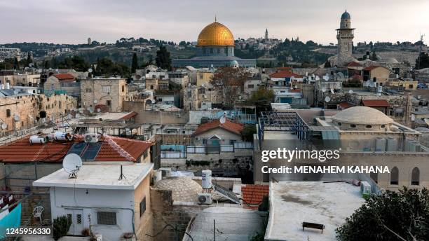 This picture taken on January 3, 2023 shows a view of the skyline in the old city of Jerusalem with the Dome of the Rock shrine in the Aqsa mosque...