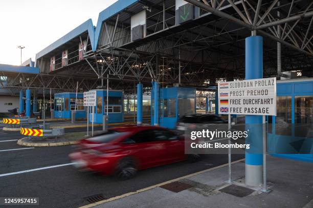 Vehicles pass freely without stopping at the former Bregana border crossing, between Croatia and Slovenia, in Zagreb, Croatia, on Monday, Jan. 2,...