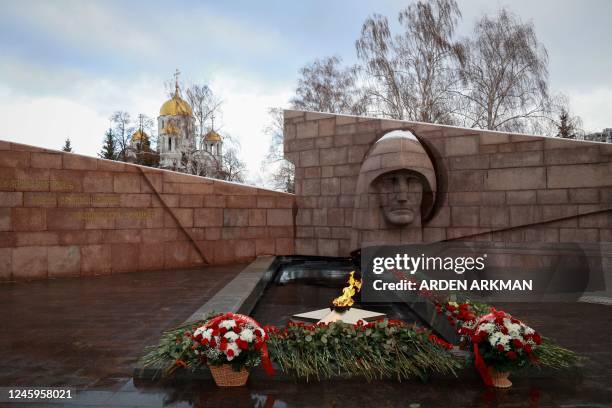 Photo shows the memorial Eternal flame and flowers laid in memory of more than 60 Russian soldiers that Russia says were killed in a Ukrainian strike...