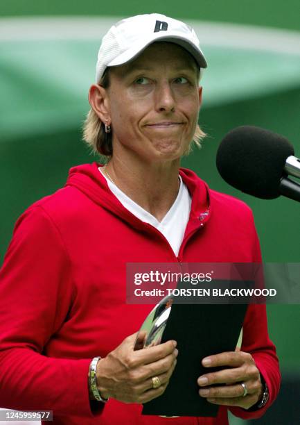 Martina Navratilova of the US looks disappointed during a post-match speech where she announced it would be her last Australian Open as a player,...
