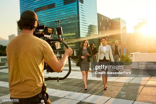 soon you'll see their names in big lights - film crew outside stock pictures, royalty-free photos & images