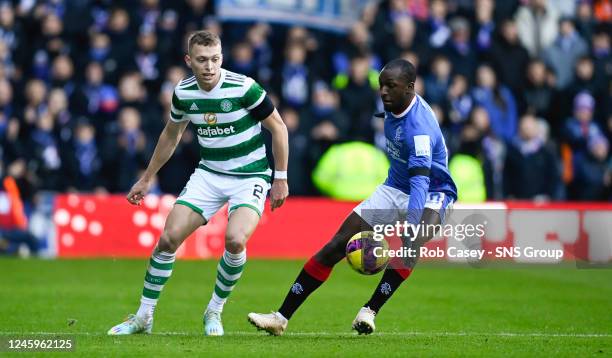 Celtic's Alastair Johnston and Rangers' Glen Kamara during a cinch Premiership match between Rangers and Celtic at Ibrox Stadium, on January 02 in...