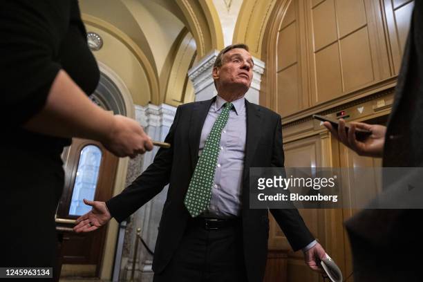 Senator Mark Warner, a Democrat from Virginia, speaks to members of the media prior to the weekly Democratic caucus luncheon at the US Capitol in...