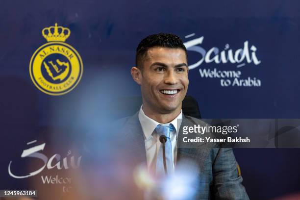 Cristiano Ronaldo attends a press conference during the official unveiling of Cristiano Ronaldo as an Al Nassr player at Mrsool Park Stadium on...