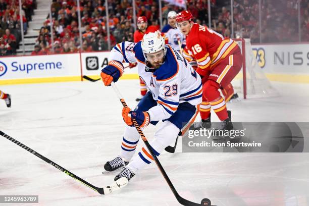 Edmonton Oilers Center Leon Draisaitl handles the puck during the second period of an NHL game between the Calgary Flames and the Edmonton Oilers on...