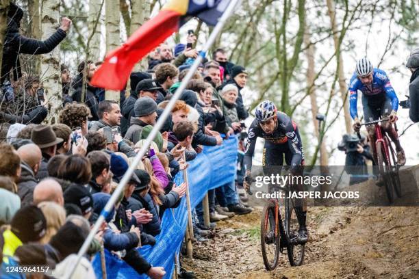 Belgium's Wout Van Aert and Netherlands' Mathieu Van Der Poel compete in the men's elite race at the 'Herentals Crosst' cyclocross cycling event at...