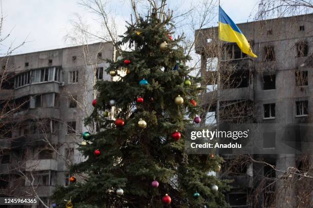 New Year tree stands near burnt-out residential buildings in the town of Borodyanka, Kyiv region, Ukraine on January 03, 2023.