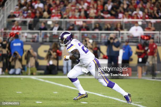Minnesota Vikings running back Adrian Peterson takes off from line during an NFL football game between the Minnesota Vikings and the San Francisco...