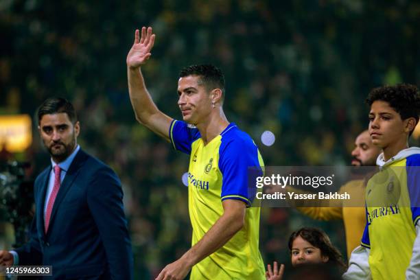 Al-Nassr's new forward Cristiano Ronaldo greets the fans during his unveiling at the Mrsool Park Stadium on January 3, 2023 in Riyadh, Saudi Arabia.