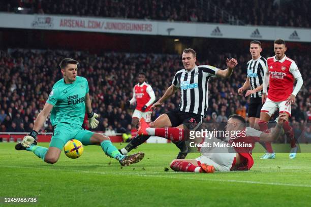 Granit Xhaka of Arsenal shoots during the Premier League match between Arsenal FC and Newcastle United at Emirates Stadium on January 3, 2023 in...