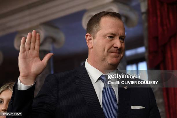 Republican Senator from Missouri Eric Schmitt is ceremonially sworn in by Vice President Kamala Harris for the 118th Congress in the Old Senate...