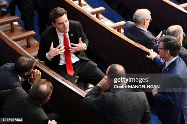 Republican Representative from Florida Matt Gaetz speaks with lawmakers as the US House of Representatives convenes for the 118th Congress at the US...