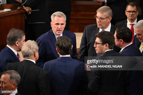 Republican Representative from California Kevin McCarthy speaks with lawmakers as the US House of Representatives convenes for the 118th Congress at...