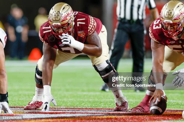 Florida State Seminoles offensive lineman D'Mitri Emmanuel lines up for a play during the Cheez-It Bowl between the Florida State Seminoles and...