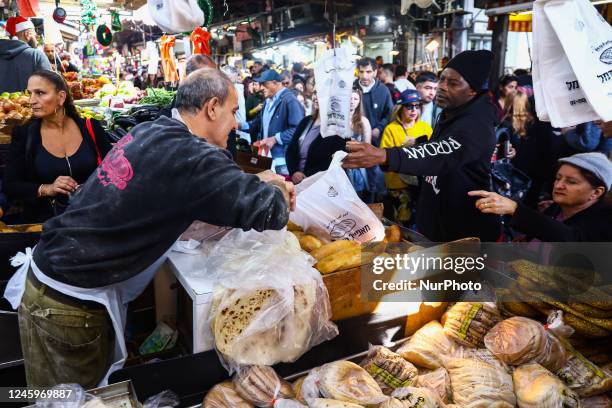 Carmel Market in Tel Aviv, Israel on December 30, 2022.