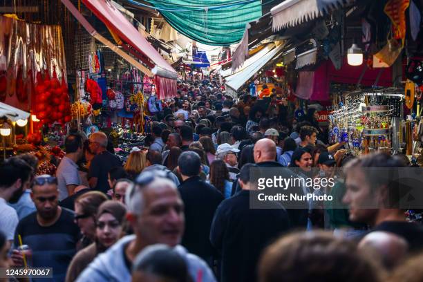 Crowd of people at Carmel Market in Tel Aviv, Israel on December 30, 2022.