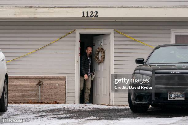 Worker leaves the crime scene at the site of a quadruple murder on January 3, 2023 in Moscow, Idaho. A suspect has been arrested for the murders of...