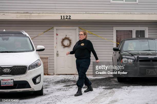 Law enforcement officer keeps watch at the site of a quadruple murder on January 3, 2023 in Moscow, Idaho. A suspect has been arrested for the...