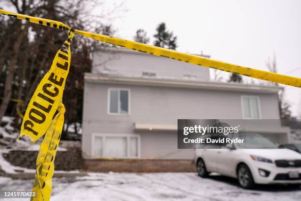 Police tape is seen at a home that is the site of a quadruple murder on January 3, 2023 in Moscow, Idaho. A suspect has been arrested for the murders...