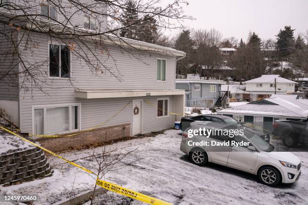 Police tape surrounds a home that is the site of a quadruple murder on January 3, 2023 in Moscow, Idaho. A suspect has been arrested for the murders...