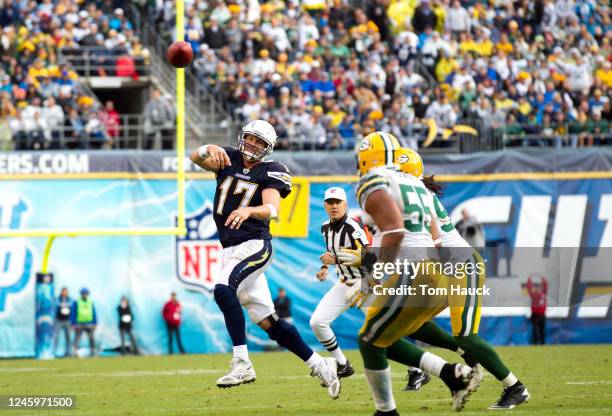 Phillip Rivers of the San Diego Chargers scrambles out to pass against the Green Bay Packers on November 6, 2011 at Qualcomm Stadium in San Diego,...