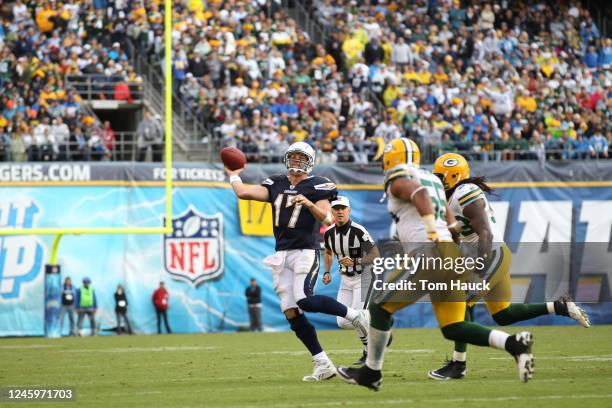 Phillip Rivers of the San Diego Chargers scrambles out to pass against the Green Bay Packers on November 6, 2011 at Qualcomm Stadium in San Diego,...