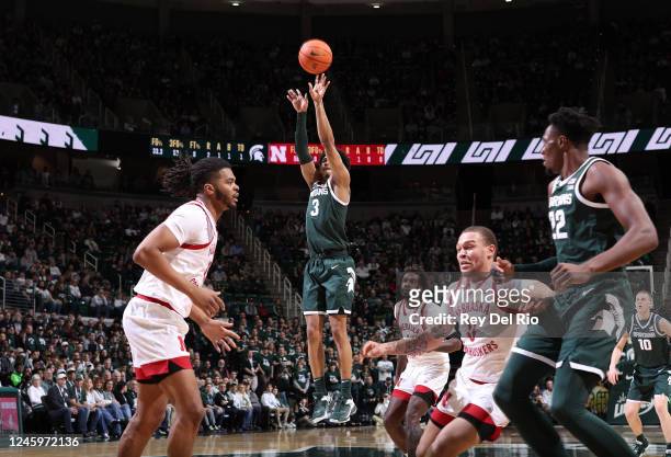 Jaden Akins of the Michigan State Spartans shoots against the Nebraska Cornhuskers in the first half at Breslin Center on January 3, 2023 in East...