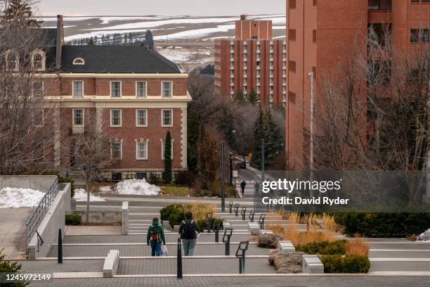 Students walk on the campus of Washington State University, where the suspect in a Moscow, Idaho quadruple murder was a graduate student, on January...