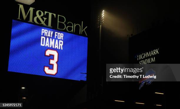 Buffalo Bills fans attend a candlelight prayer vigil for player Damar Hamlin at Highmark Stadium on January 3, 2023 in Orchard Park, New York. Hamlin...