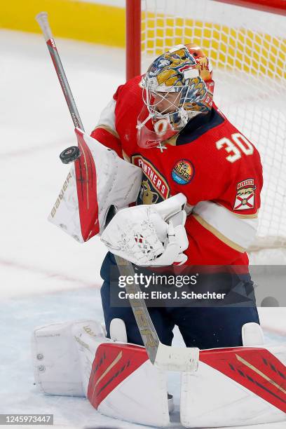 Goaltender Spencer Knight of the Florida Panthers defends the net during the second period against the Arizona Coyotes at the FLA Live Arena on...