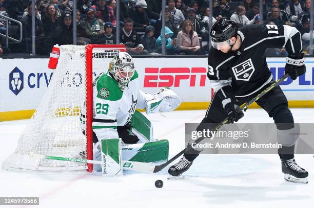 Jake Oettinger of the Dallas Stars protects the goal with pressure from Gabriel Vilardi of the Los Angeles Kings during the first period at...