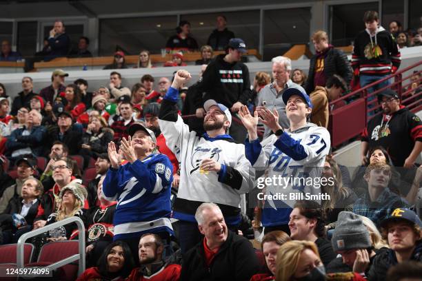 Tampa Bay Lightning fans cheer during the game between the Chicago Blackhawks and the Tampa Bay Lightning at United Center on January 03, 2023 in...