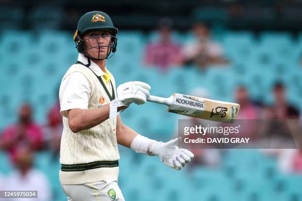 Australias Marnus Labuschagne reacts as he walks off the ground after being dismissed by South Africa's Anrich Nortje during day one of the third...
