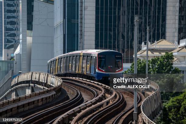 Bangkok Mass Transit System train arrives at a station in Bangkok on January 4, 2023.